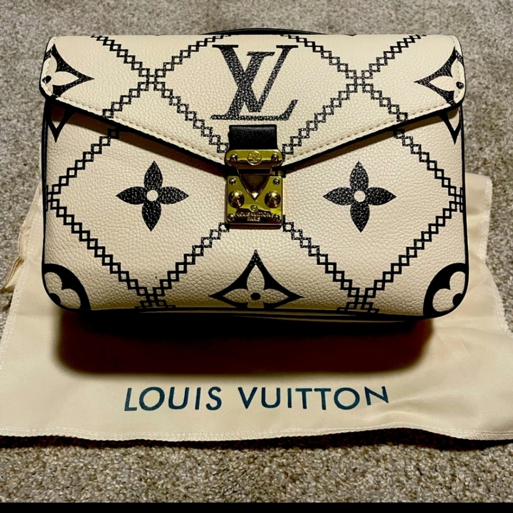 LV inspection  pochette metis
